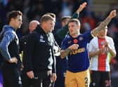 Kieran Trippier speaks to Eddie Howe, Manager of Newcastle United during the Premier League match between Southampton FC and Newcastle United at Friends Provident St. Mary’s Stadium on November 06, 2022 in Southampton, England. 