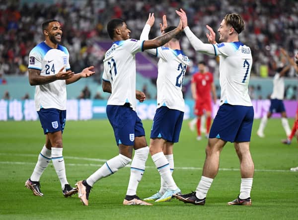 Jack Grealish celebrates with Callum Wilson and Marcus Rashford  after scoring their team’s sixth goal during the FIFA World Cup Qatar 2022 Group B match between England and IR Iran at Khalifa International Stadium on November 21, 2022 in Doha, Qatar. 