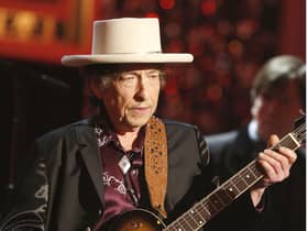 Bob Dylan has issued a rare public apology for selling books with automated signatures.  