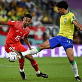 Switzerland midfielder Djibril Sow and Brazil defender Marquinhos fight for the ball (Photo by ANNE-CHRISTINE POUJOULAT/AFP via Getty Images)