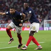 Marcus Thuram (right) celebrates with France teammate Kylian Mbappe (left) at the FIFA World Cup in Qatar.