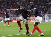 Marcus Thuram (right) celebrates with France teammate Kylian Mbappe (left) at the FIFA World Cup in Qatar.