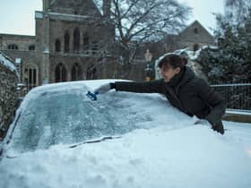 ROCHESTER, UNITED KINGDOM - FEBRUARY 27:  A woman scrapes ice from her car on February 27, 2018 in Rochester, United Kingdom. 