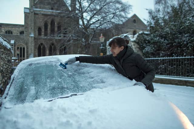 ROCHESTER, UNITED KINGDOM - FEBRUARY 27:  A woman scrapes ice from her car on February 27, 2018 in Rochester, United Kingdom. 