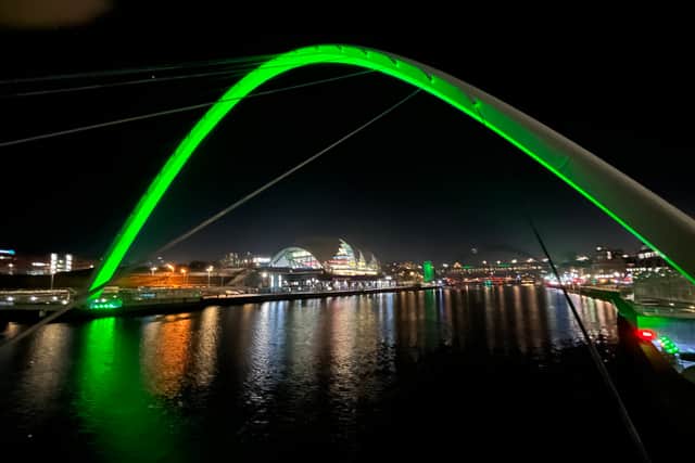 The Gateshead Millennium Bridge shines green in honour of Gordon Gault (Image: NewcastleWorld)