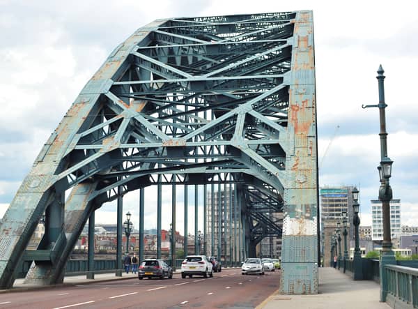 The iconic Tyne Bridge on the River Tyne between Newcastle and Gateshead which is in an alarming state, covered in rust patches and grafitti.