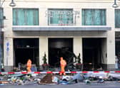 Berlin’s AquaDom aquarium containing 1,500 tropical fish bursts causing major flooding on nearby streets.