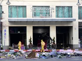 Berlin’s AquaDom aquarium containing 1,500 tropical fish bursts causing major flooding on nearby streets.