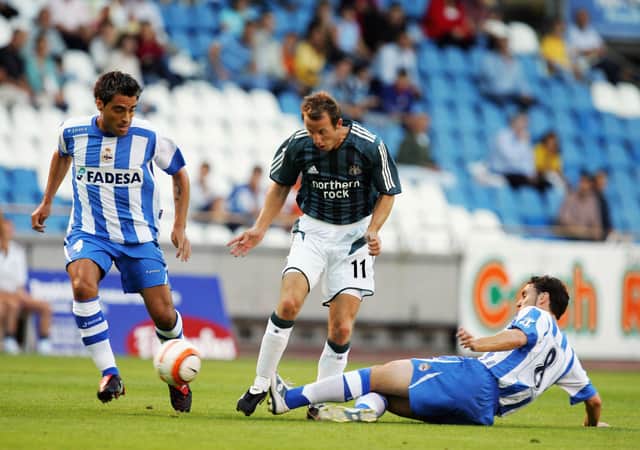 Newcastle United’s Lee Bowyer is tackled by Deportivo La Coruna’s Sergio (Photo by Denis Doyle/Getty Images)
