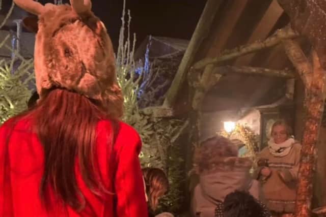 Cheryl and son, Bear on a visit to Lapland UK