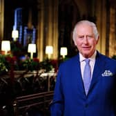  In this image released on December 23, King Charles III is seen during the recording of his first Christmas broadcast in the Quire of St George's Chapel at Windsor Castle, on December 13, 2022 in Windsor, England. (Photo by Victoria Jones - Pool/Getty Images)