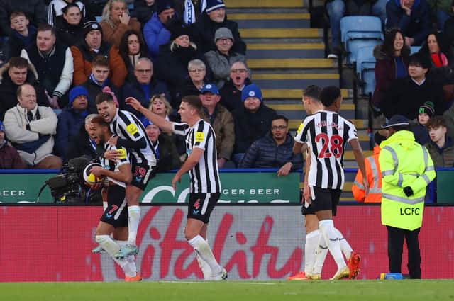 Joelinton of Newcastle United celebrates with teammates after scoring the team’s third goal during the Premier League match between Leicester City and Newcastle United at The King Power Stadium on December 26, 2022 in Leicester, England.