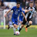 Jorginho holds off Chris Wood during the Premier League match between Chelsea and Newcastle United at Stamford Bridge (Photo by Justin Setterfield/Getty Images)