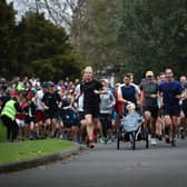AUCKLAND, NEW ZEALAND - JULY 04: People run the 5km Parkrun around Western Springs Park on July 04, 2020 in Auckland, New Zealand. Parkrun events across New Zealand have resumed following their temporary suspension due to COVID-19. New Zealand is the only country in the world where the event is running at present due to the ongoing coronavirus pandemic. Parkrun is a free weekly 5km morning run or walk for people of all ages and abilities, with events held all over the world. (Photo by Phil Walter/Getty Images)