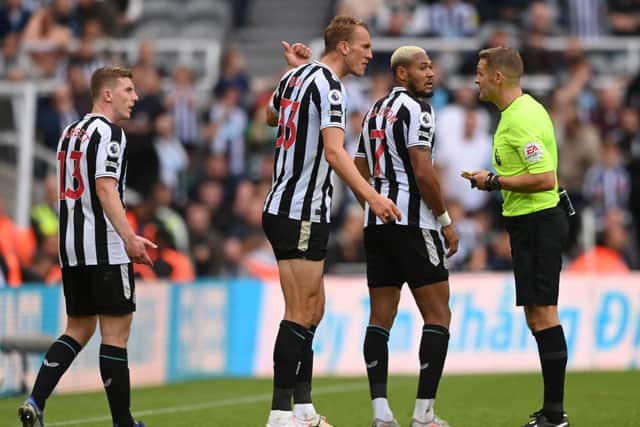 Newcastle United duo Dan Burn (right) and Matt Targett (left).  (Photo by Stu Forster/Getty Images)