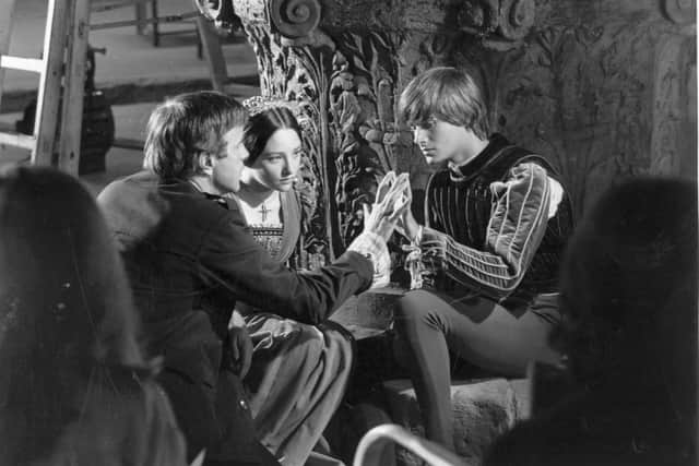 Italian stage and film director, Franco Zeffirelli with Olivia Hussey and Leonard Whiting, during the filming of 'Romeo and Juliet'. (Photo by Express/Express/Getty Images)
