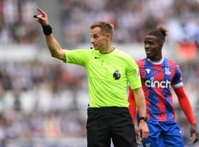 Referee Michael Salisbury makes a decision during the Premier League match between Newcastle United and Crystal Palace in September 2022 (Photo by Stu Forster/Getty Images)