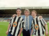 NEWCASTLE UPON TYNE, ENGLAND - MAY 10:  Newcastle United manager Kevin Keegan (c) is joined by entertainers Ant (Anthony McPartlin) (l) and Dec ( Declan Donnelly) at the launch at St James's Park on May 10, 1995 of the new adidas 'grandad collar shirt' which along with the Newcastle Brown Ale logo proved to be an iconic shirt used by the 'Entertainers' team of the 1995/96 season. (Photo by Gary M Prior/Allsport/Getty Images)