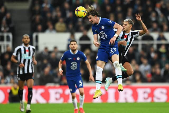 Conor Gallagher of Chelsea jumps for the ball with Bruno Guimaraes (Photo by Stu Forster/Getty Images)