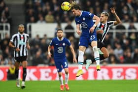 Conor Gallagher of Chelsea jumps for the ball with Bruno Guimaraes (Photo by Stu Forster/Getty Images)