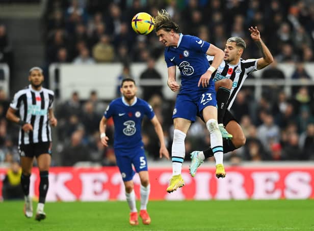 Conor Gallagher of Chelsea jumps for the ball with Bruno Guimaraes (Photo by Stu Forster/Getty Images)