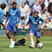 Ruben Loftus-Cheek looks on as Conor Gallagher warms up prior to kick off of the Premier League match between Leeds United and Chelsea FC (Photo by Catherine Ivill/Getty Images)