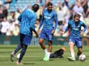 Ruben Loftus-Cheek looks on as Conor Gallagher warms up prior to kick off of the Premier League match between Leeds United and Chelsea FC (Photo by Catherine Ivill/Getty Images)