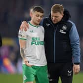 Kieran Trippier of Newcastle United speaks with Eddie Howe, Manager of Newcastle United, after the Premier League match between Crystal Palace and Newcastle United at Selhurst Park on January 21, 2023 in London, England. 