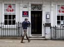 Customers use a NatWest bank on the High Street in Winchester, south west England on March 31, 2021. (Photo by ADRIAN DENNIS / AFP) (Photo by ADRIAN DENNIS/AFP via Getty Images)