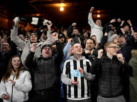 LONDON, ENGLAND - JANUARY 21: Fans of Newcastle United celebrate during the Premier League match between Crystal Palace and Newcastle United at Selhurst Park on January 21, 2023 in London, England. (Photo by Justin Setterfield/Getty Images)