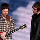 Liam And Noel Gallagher have been told to bury the hatchet as mum Peggy turns 80.