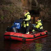 Specialists search the River Wyre this morning (February 6).