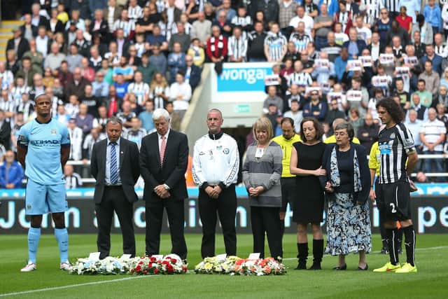 John Alder and Liam Sweeney are remembered before a match in 2014 (Image: Getty Images)
