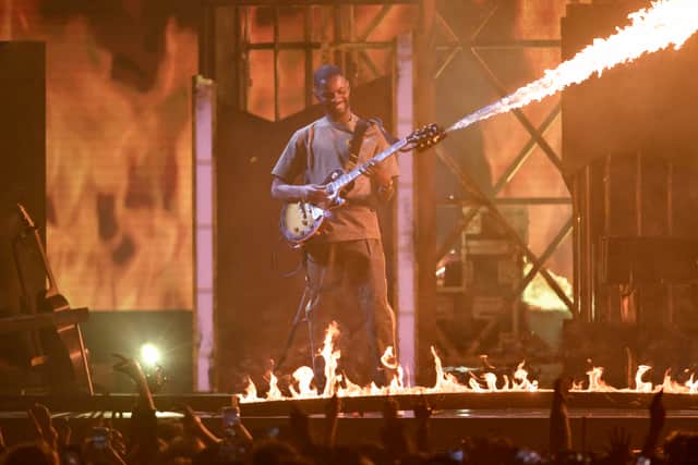 Dave - who picked up the award for Best Hip Hop/Grime/Rap Act - jumped onto the electric guitar and delivered a solo so hot it generated flames