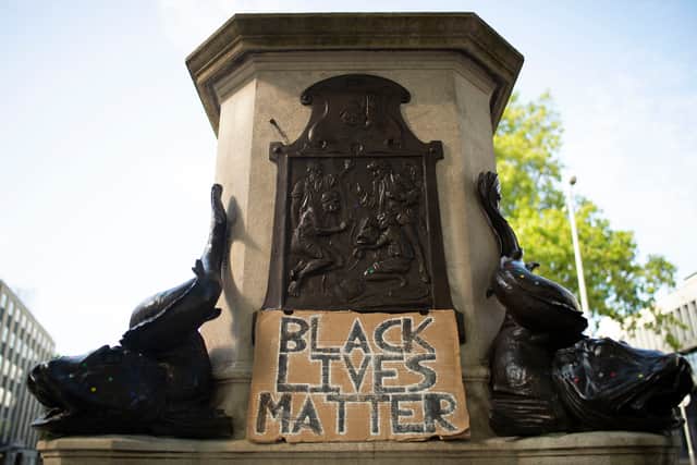 BRISTOL, ENGLAND - JUNE 16: The Edward Colston statue plinth with a sign saying “Black Lives Matter” on June 16, 2020 in Bristol, England. A statue of slave trader Edward Colston was pulled down and thrown into Bristol Harbour during Black Lives Matter protests sparked by the murder of an African American man, George Floyd.