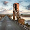 Holy Island is a popular site for day-trippers (Image: Adobe Stock)