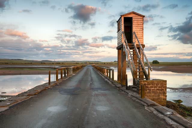 Holy Island is a popular site for day-trippers (Image: Adobe Stock)