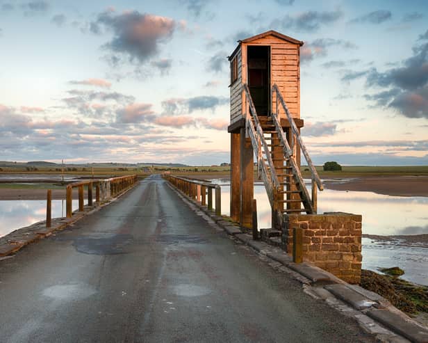 Holy Island is a popular site for day-trippers (Image: Adobe Stock)