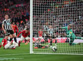 LONDON, ENGLAND - FEBRUARY 26: Casemiro of Manchester United scores the team's first goal past Loris Karius of Newcastle United  during the Carabao Cup Final match between Manchester United and Newcastle United at Wembley Stadium on February 26, 2023 in London, England. (Photo by Eddie Keogh/Getty Images)
