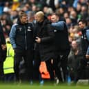 Newcastle United head coach Eddie Howe (left) & Manchester City boss Pep Guardiola. (Photo by Michael Regan/Getty Images)