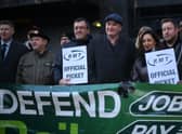 RMT general secretary Mick Lynch (centre) on an RMT picket line during January’s strike (Photo by DANIEL LEAL/AFP via Getty Images)