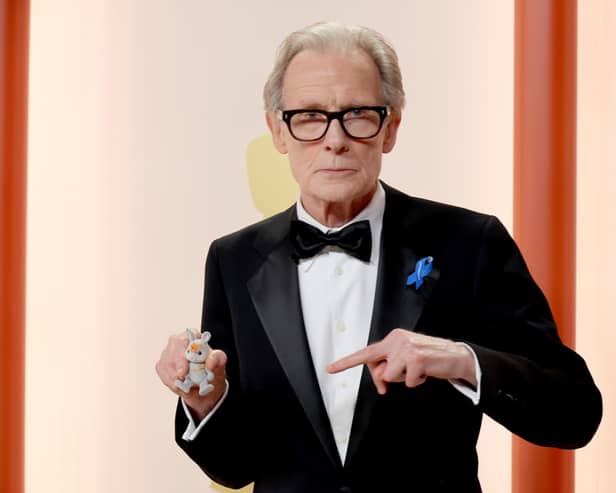 Bill Nighy and his rabbit companion at the 2023 Academy Awards.