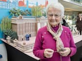 A 93-year-old great-great-gran who has a British Empire Medal (BEM) for her knitting has since created a massive 6ft Buckingham Palace out of wool.