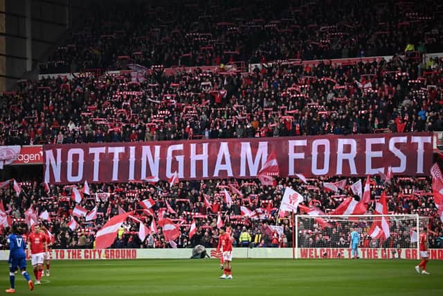 Nottingham Forest fans sing Mull of Kintyre ahead of kick-off in the English Premier League football match between Nottingham Forest and Everton at The City Ground in Nottingham, central England, on March 5, 2023. (Photo by Oli SCARFF / AFP)