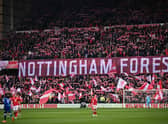 Nottingham Forest fans sing Mull of Kintyre ahead of kick-off in the English Premier League football match between Nottingham Forest and Everton at The City Ground in Nottingham, central England, on March 5, 2023. (Photo by Oli SCARFF / AFP)