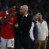 SEVILLE, SPAIN - MARCH 16: Manager Erik ten Hag of Manchester United speaks to Marcus Rashford during the UEFA Europa League round of 16 leg two match between Real Betis and Manchester United at Estadio Benito Villamarin on March 16, 2023 in Seville, Spain. (Photo by Matthew Peters/Manchester United via Getty Images)