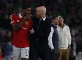 SEVILLE, SPAIN - MARCH 16: Manager Erik ten Hag of Manchester United speaks to Marcus Rashford during the UEFA Europa League round of 16 leg two match between Real Betis and Manchester United at Estadio Benito Villamarin on March 16, 2023 in Seville, Spain. (Photo by Matthew Peters/Manchester United via Getty Images)
