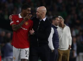 SEVILLE, SPAIN - MARCH 16: Manager Erik ten Hag of Manchester United speaks to Marcus Rashford during the UEFA Europa League round of 16 leg two match between Real Betis and Manchester United at Estadio Benito Villamarin on March 16, 2023 in Seville, Spain. (Photo by Matthew Peters/Manchester United via Getty Images)