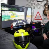 Rookie driver Will Crewdson trains on his professional racing simulator around studying for his GCSEs.