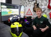 Rookie driver Will Crewdson trains on his professional racing simulator around studying for his GCSEs.